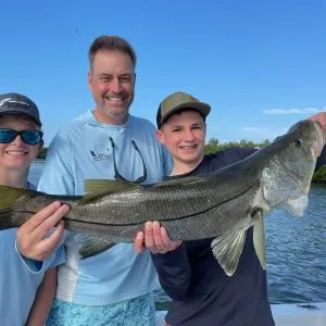 Snook inshore charters snook inshore fishing fishing charters on ami Happy Family with a large snook